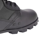 Close-up of genuine U.S. Army Jungle black leather PANAMA combat boots with durable tread and ventilation holes