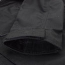 Close-up of black Mil-Tec ripstop fabric jacket cuff with adjustable strap and narrow fit design detail.