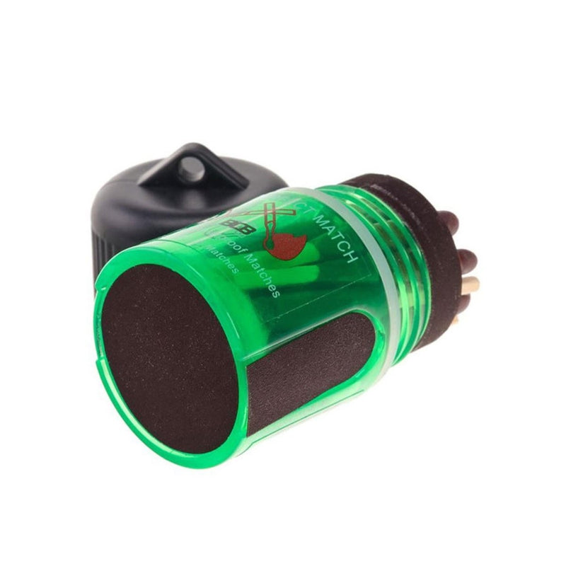 Compact green container of BCB wind and waterproof matches with striker pads for hiking and survival emergencies.