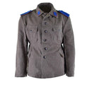 Vintage genuine Bulgarian Army wool jacket in grey-brown with blue shoulder patches and button closure, military surplus uniform style.