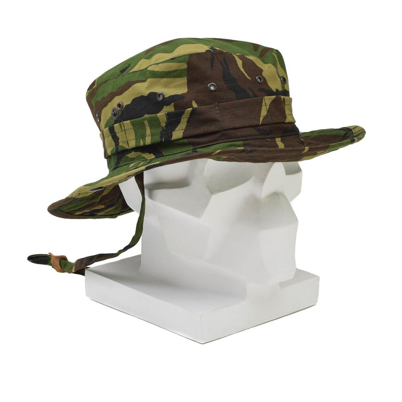 Genuine Dutch military boonie hat with DPM camo, wide brim, neck flap, and adjustable chin strap on white mannequin head.