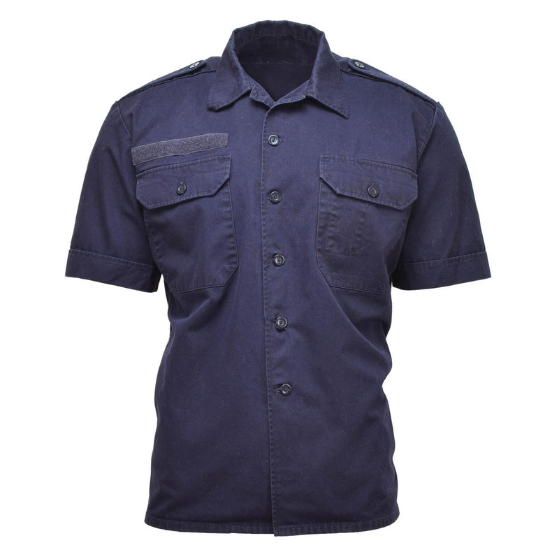 Solid blue Dutch military surplus short sleeve shirt with button front, chest pockets, and shoulder epaulets.