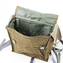 Open genuine East German army rucksack with raindrop camo, showing adjustable straps and durable interior lining.