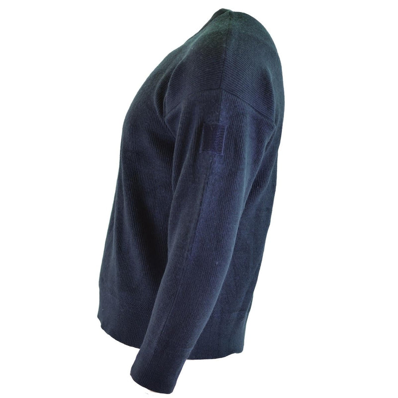 Side view of a genuine French army blue commando jumper with round neck and hook and loop attachments.