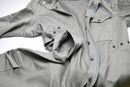 Genuine Italian Army military grey coverall suit with zip-front and buttoned pockets laid flat on white background.
