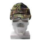 Original Romanian M93 leaf camouflage field cap with adjustable neck flap on white mannequin head