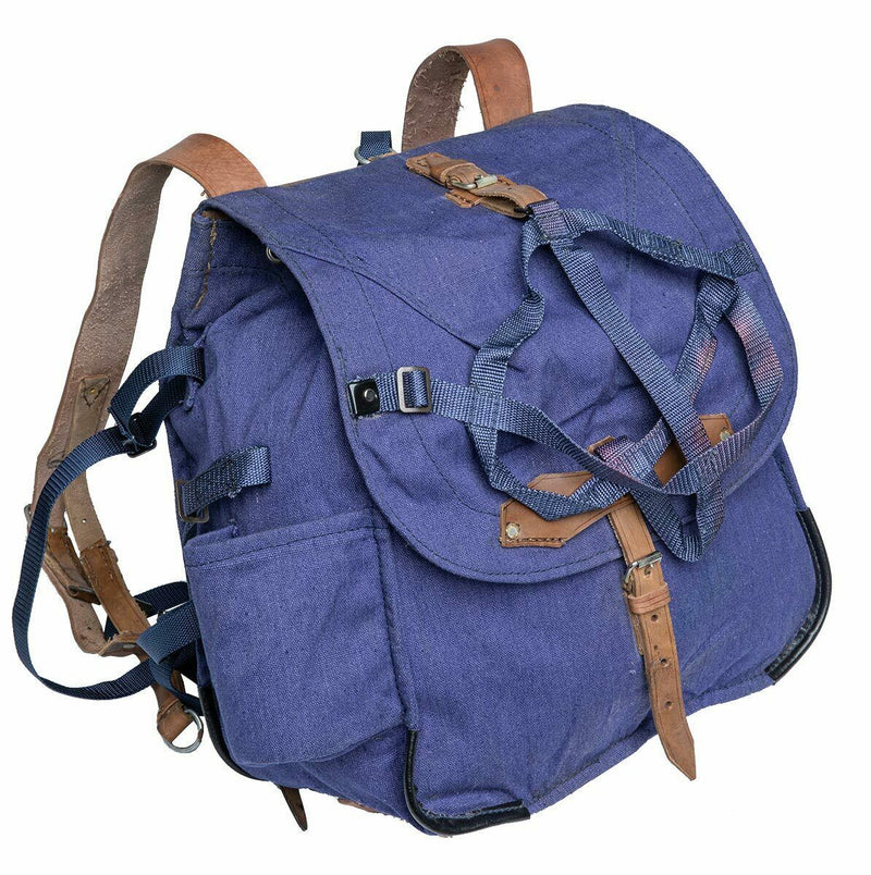 Genuine Romanian Army rucksack in blue canvas with leather straps and multiple compartments for durable outdoor use.