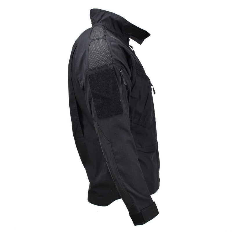 Mil-Tec black narrow fit military jacket with ripstop fabric, adjustable cuffs, and multiple pockets for durability and functionality.