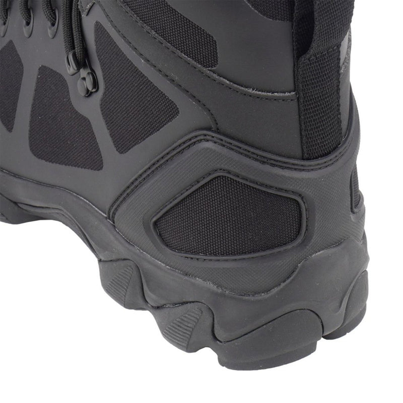 Close-up of the black MIL-TEC Chimera high duty combat boot heel with textured slip-resistant sole and reinforced fabric panels.