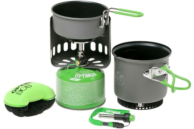 Compact Optimus Electra FE camping stove set with pot, heat exchanger, and folding handles for outdoor cooking efficiency.