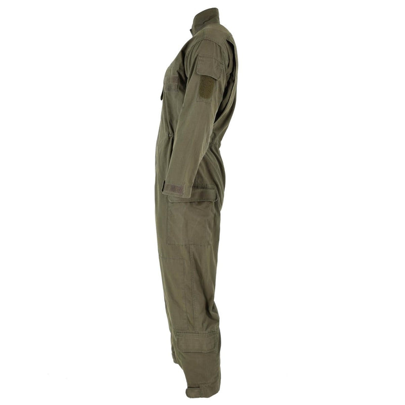 Side view of original olive green Austrian army ripstop coverall jumpsuit with multiple pockets and adjustable cuffs.