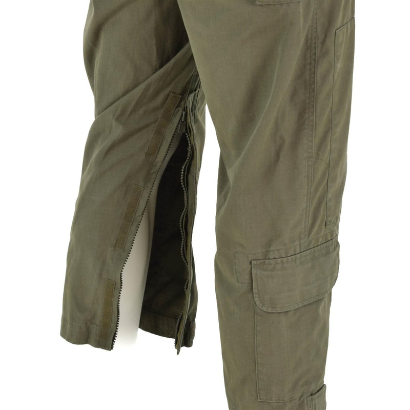 Close-up of olive green Austrian army coverall leg showing zipper and hook and loop fastening details