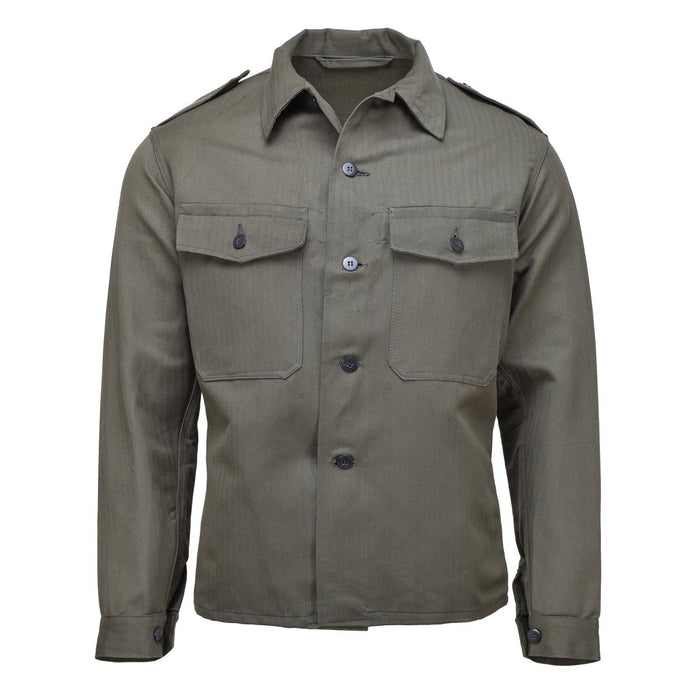 Vintage Austrian M59 field jacket in olive, button-up front with pockets and adjustable cuffs, WWII military style shirt jacket.