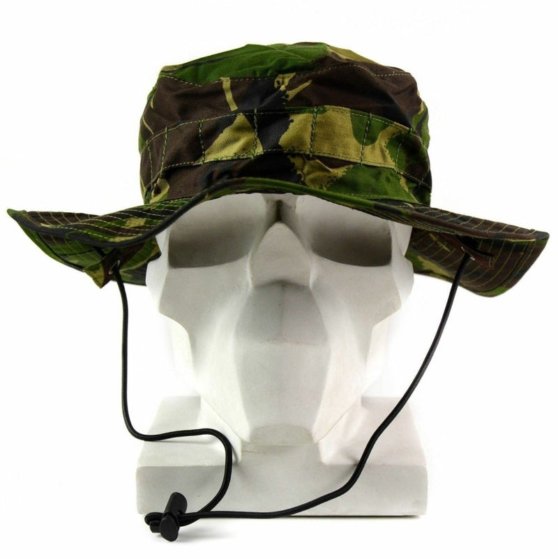 Authentic British Army boonie cap in woodland camo with chin strap and wide brim for sun protection and comfort