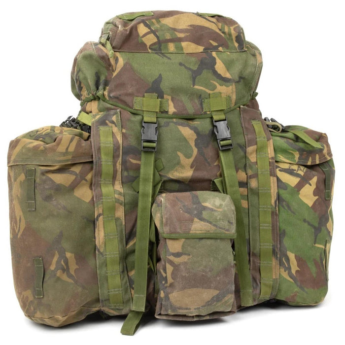 Original British military tactical backpack with woodland camo, 90 liters capacity, side pockets, and durable Cordura nylon design.