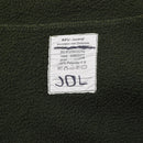 Close-up of olive green Dutch Military fleece jacket label showing fabric and care instructions on soft thermal material