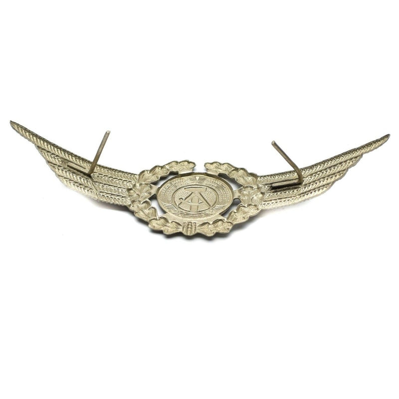 Original East German NVA DDR army military cap hat cockade pin badge with detailed wing design and central emblem