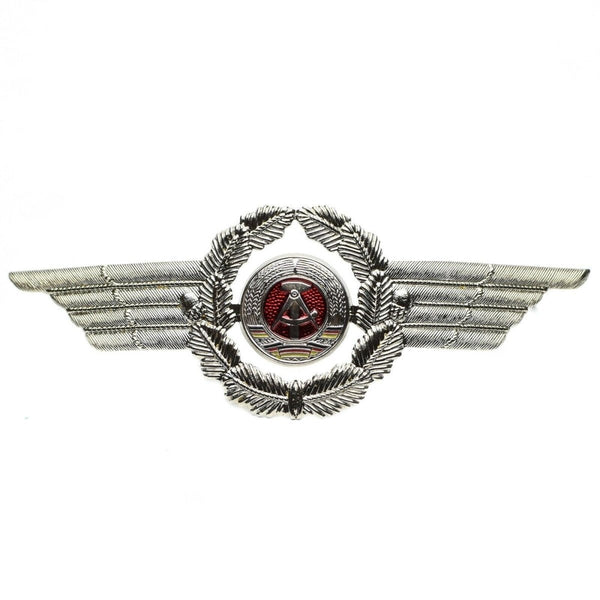 Original East German NVA DDR army military cap hat cockade pin badge with winged silver wreath and red emblem center