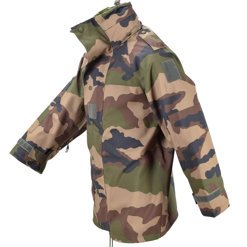 French military waterproof trilaminate field jacket with CCE camo, reinforced elbows, and storm flap closure.