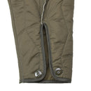 Close-up of olive quilted liner with buttoned cuffs for German military winter coverall jumpsuit lining