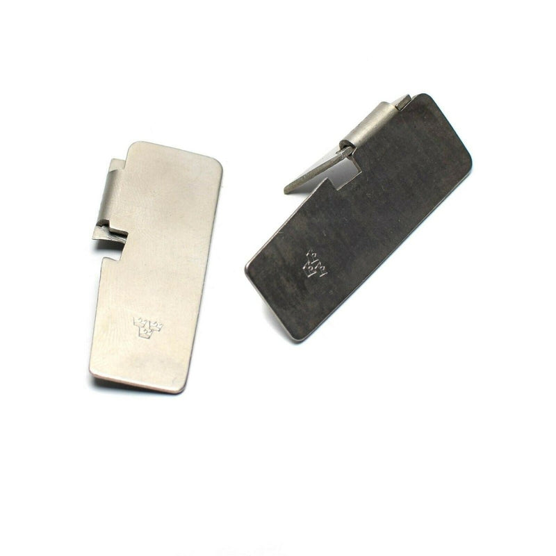 Two views of a compact Swedish army steel tin can opener survival tool with a minimalist design