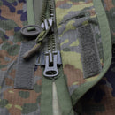Close-up of YKK zipper and buttoned storm flap on TACGEAR German Military style Flecktarn smock jacket