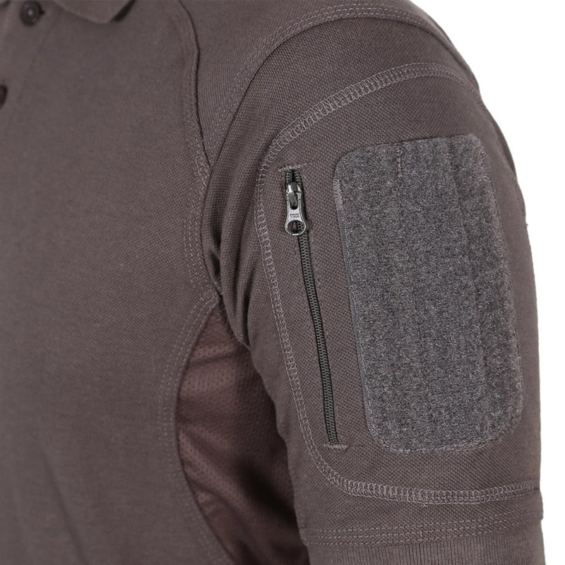 Close-up of TEXAR Elite Pro tactical polo shirt sleeve with zippered pocket and hook-and-loop patch in dark brown color